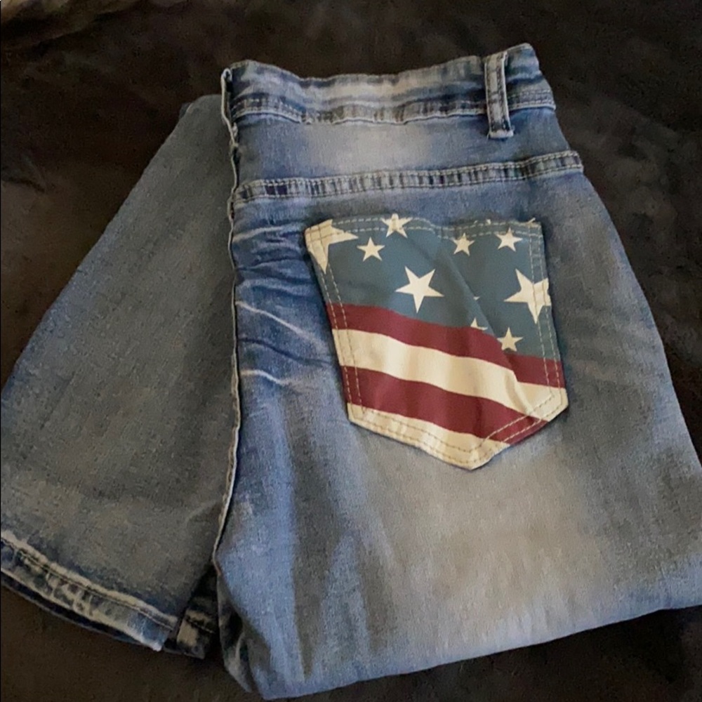 Brand new jeans /American flag. Never worn. Too small but true to sz 8.